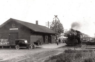 A Milwaukee Road passenger train approaching the depot at Richfield, Wisconsin in 1915