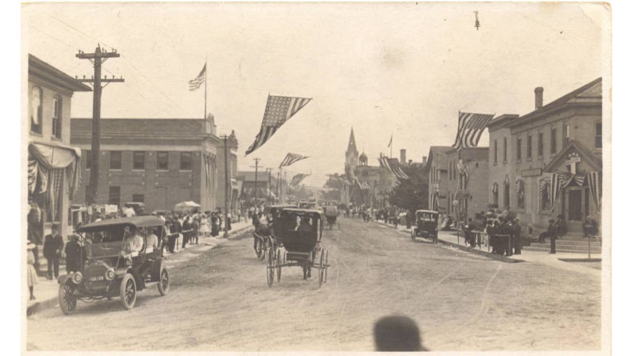 The American flag at Kewaskum’s Main Street in Early Washington County, Wisconsin
