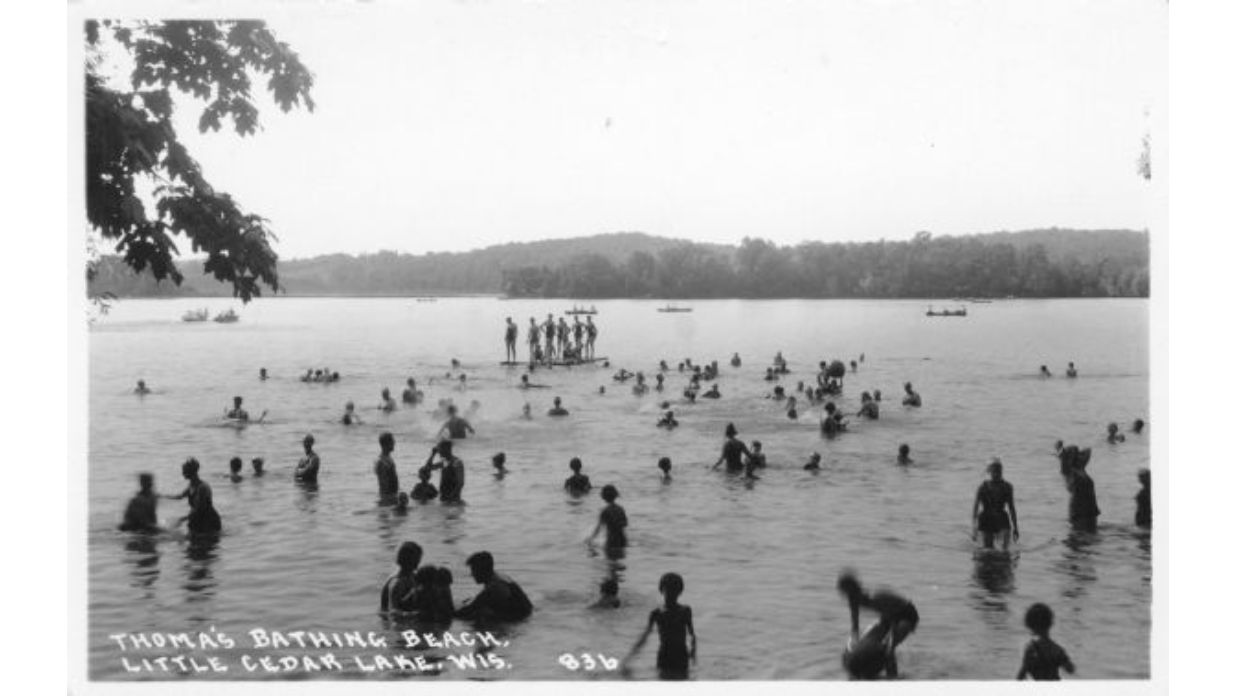 Thoma's Bathing Beach  with The Tower Heritage Center home to the Washington County Historical Society in West Bend, Wisconsin