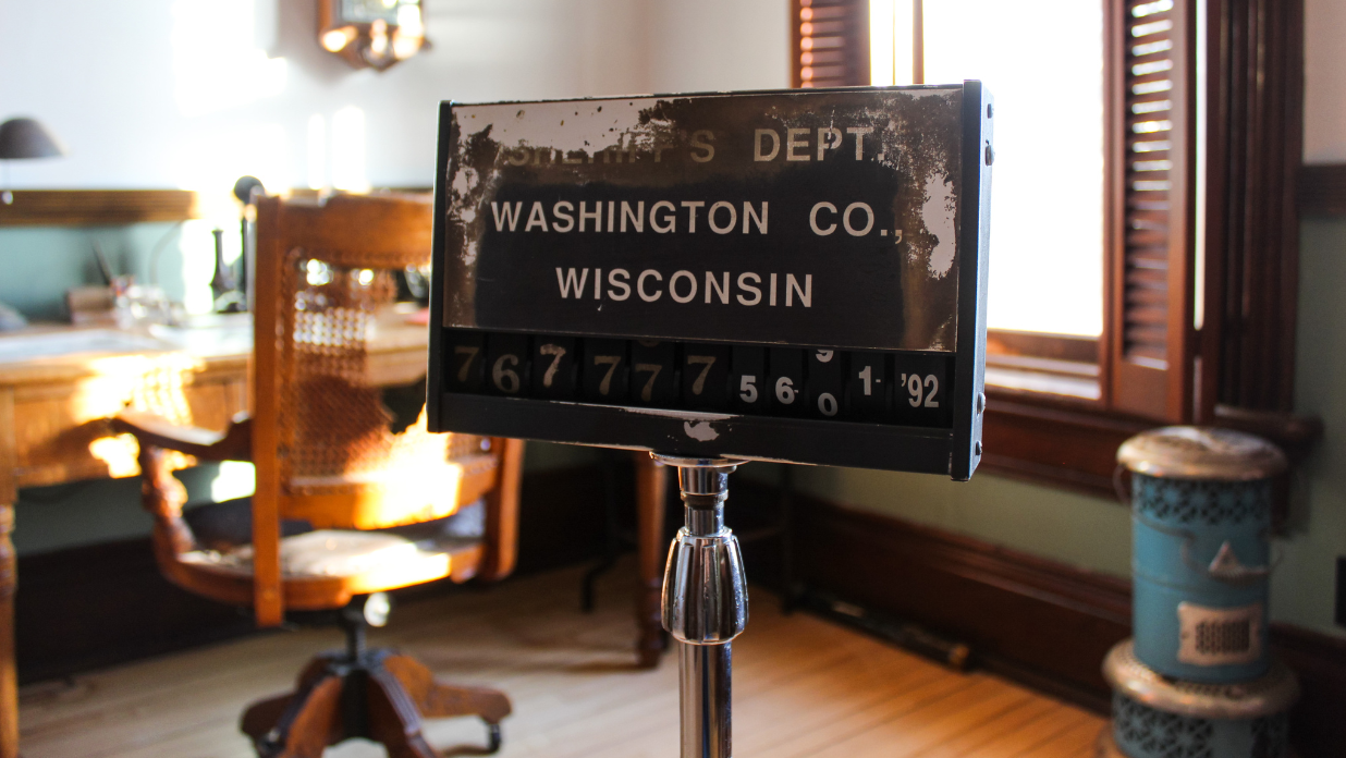 Booking sign in Wisconsin's historic Jailhouse with The Tower Heritage Center