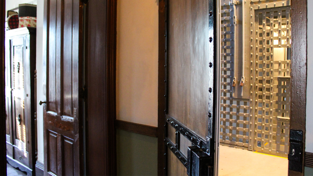 Jail cell door in historic 1886 Jailhouse with The Tower Heritage Center